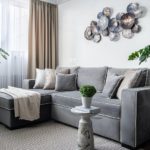 Угловой диван в интерьере гостиной